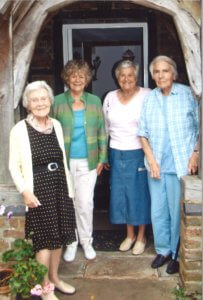 Photo of four senior members of LGDC